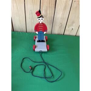 Vintage Childs Pull Along Wooden Soldier Toy On Wheels !!!